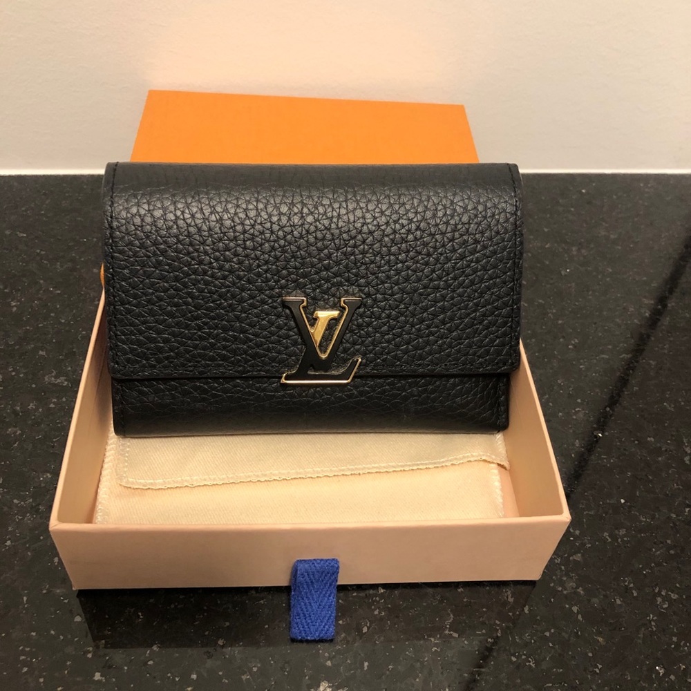 LOUIS VUITTON CAPUCINES COMPACT WALLET SOLD